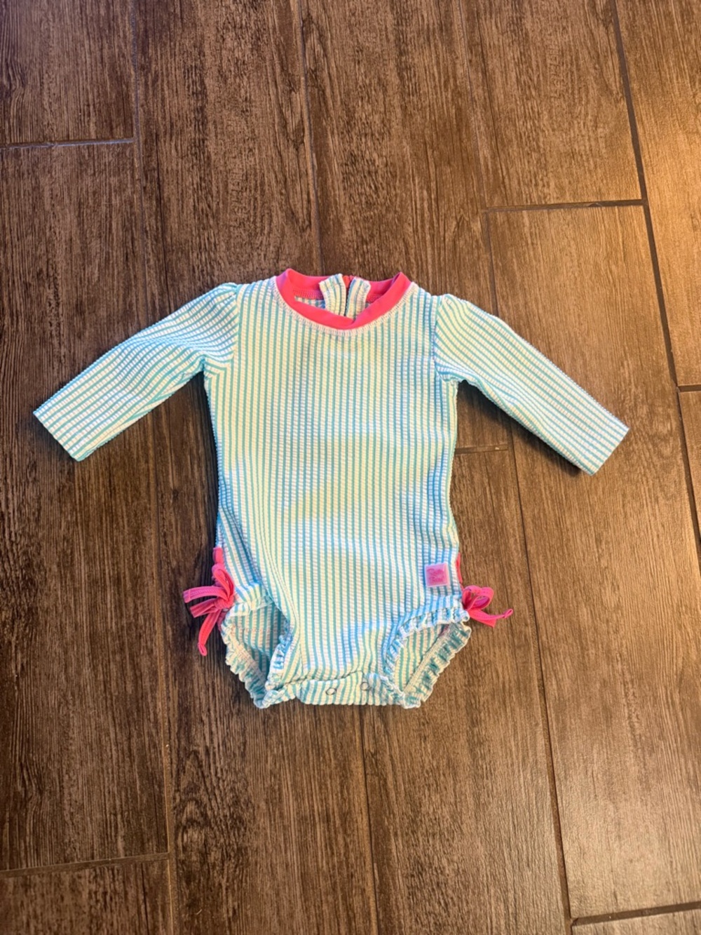 Size 3-6 months RuffleButts swimsuit..